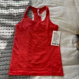 Lululemon racer back 2.0 tank top (coral) size 4